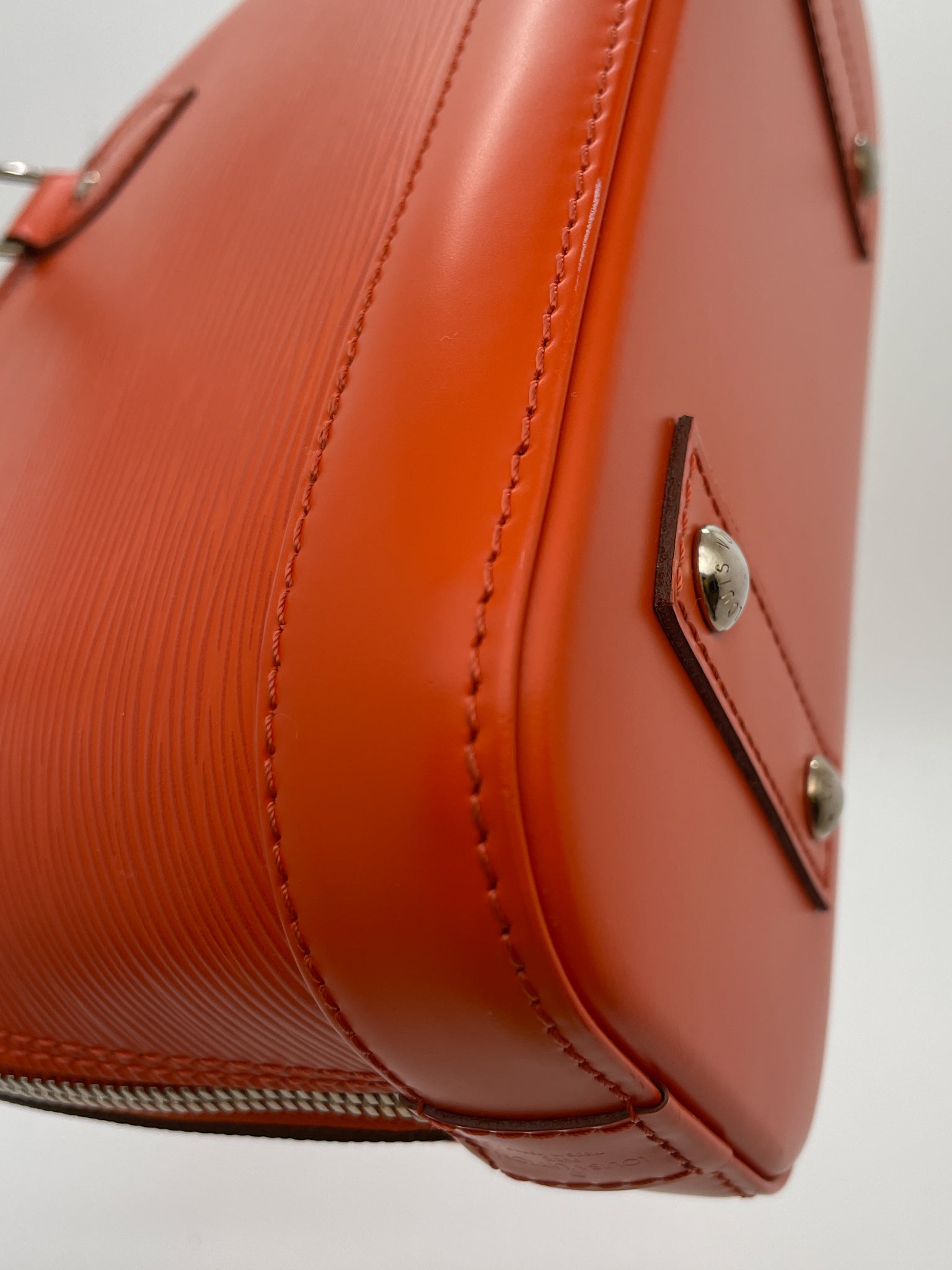 Alma bb leather crossbody bag Louis Vuitton Orange in Leather - 14635210